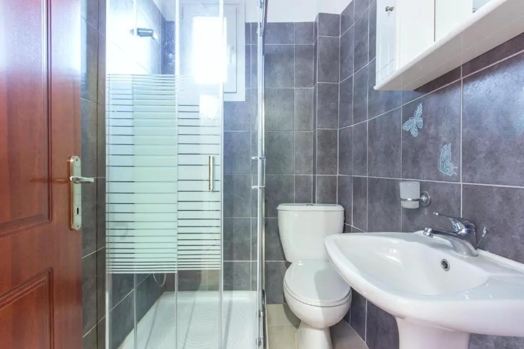 Living room with armchairs and sea view