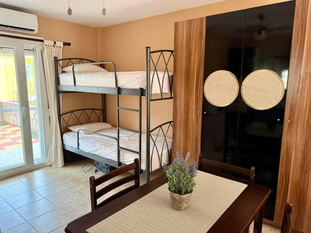 Bunk beds and wardrobe near the terrace